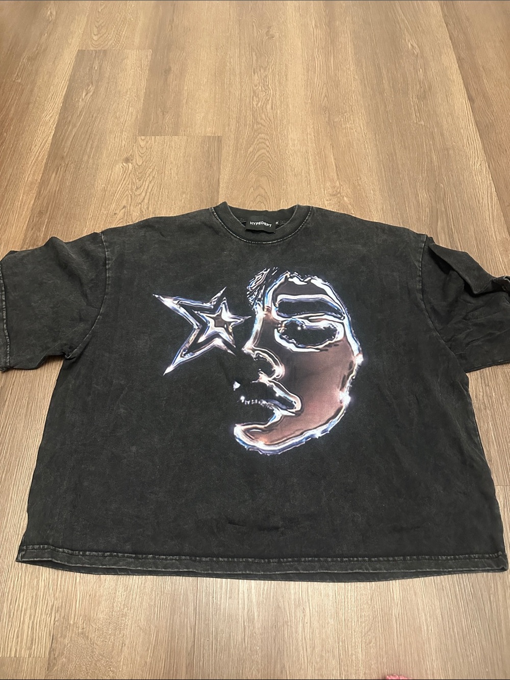 Black Short-Sleeve Graphic Tee with Metallic Face and Star Motif